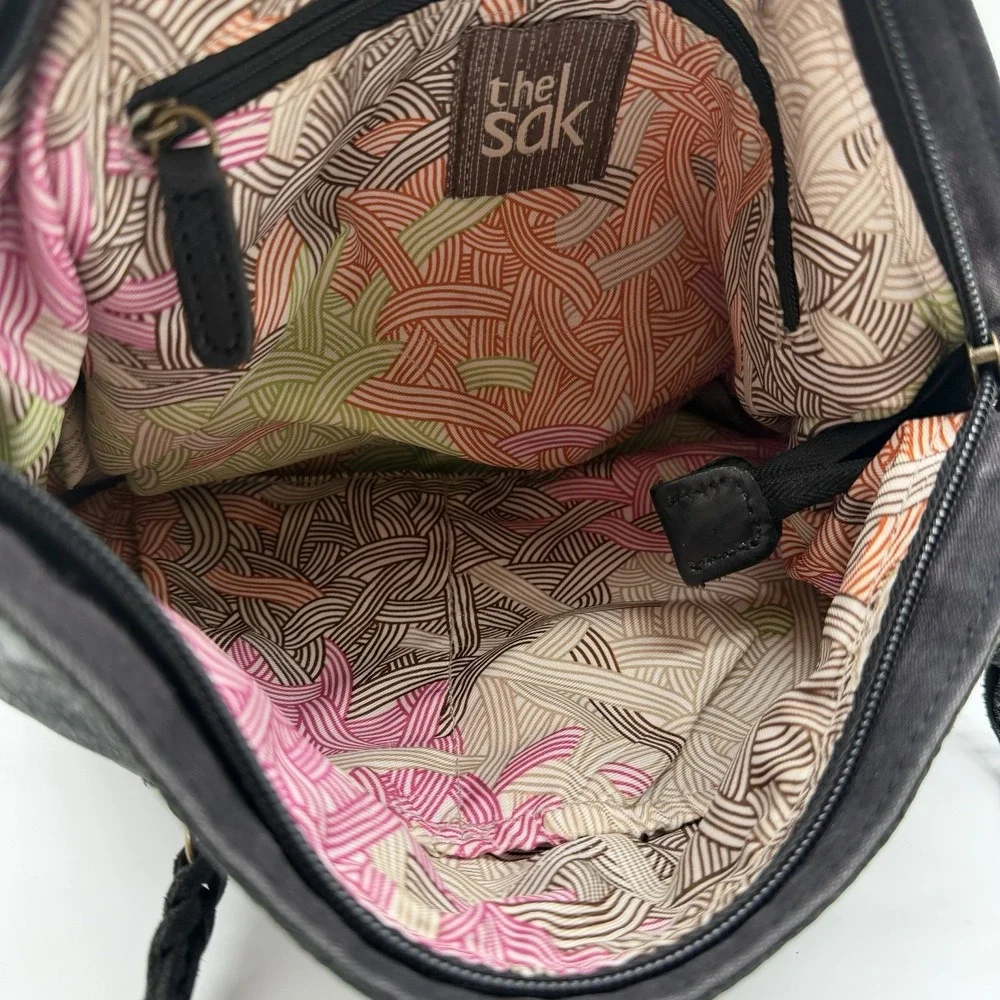 The Sak Indio Demi Leather Hobo Bag Braided Strap Whipstitch Charm Logo Black